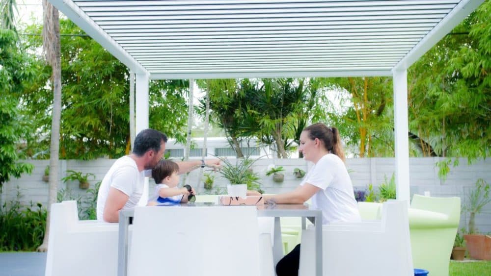 Residential R-BLADE pergola with motorized louvered roof