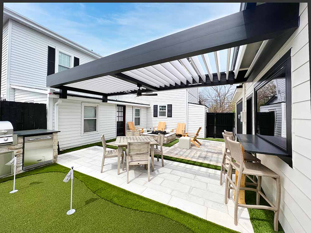 Black R-BLADE pergola with fan and integrated LED lighting