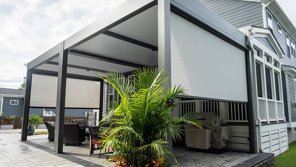 R-BLADE pergola with patio screens for shade and privacy