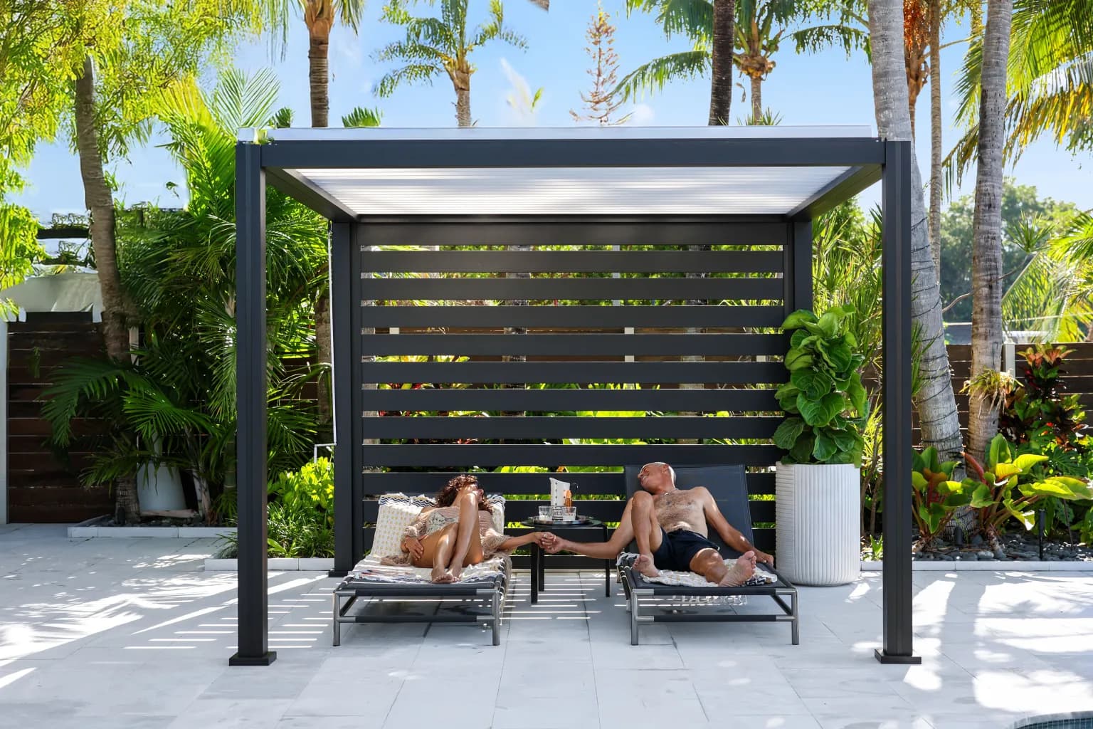 K-BANA freestanding pergola beside a pool